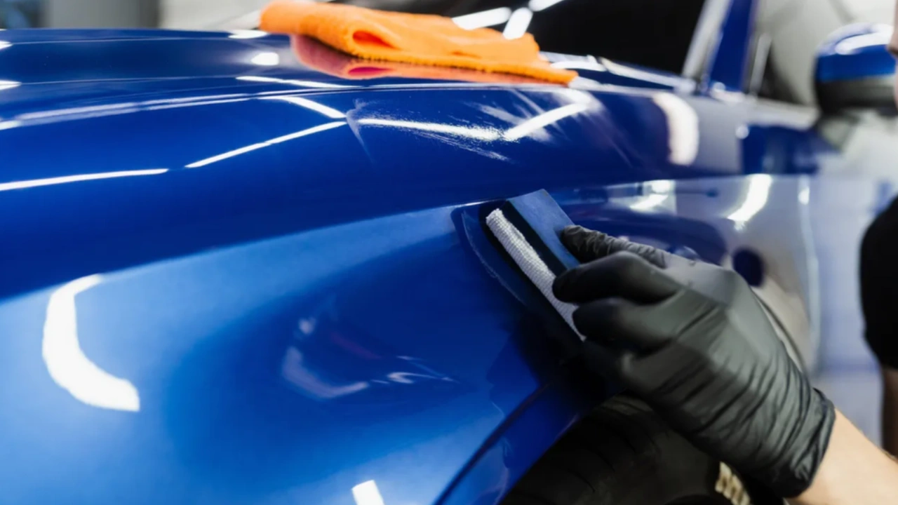 car-detailer-applies-blue